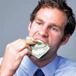 businessman_money_in_mouth